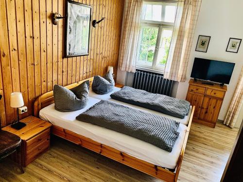 Gästehaus Hohe Tannen客房内的一张或多张床位