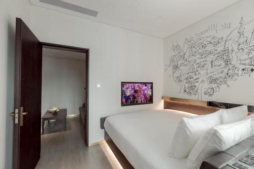 上海国际旅游度假区CitiGO欢阁酒店客房内的一张或多张床位