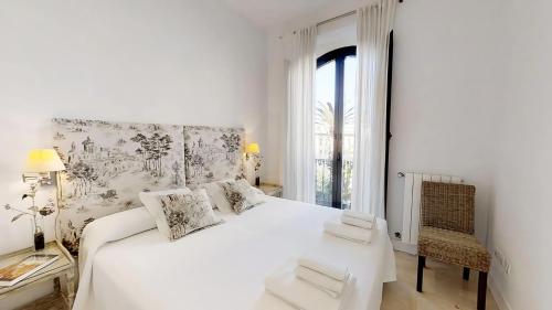 Sevilla Luxury Rentals - Alcazar客房内的一张或多张床位