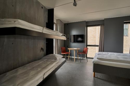 Zleep Hotel Copenhagen Arena客房内的一张或多张双层床