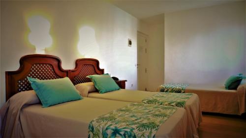 阿雅蒙提诺酒店客房内的一张或多张床位
