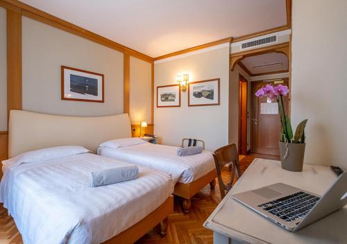 伊索欧拉哥酒店客房内的一张或多张床位