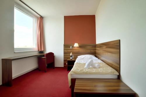 派勒萨特酒店客房内的一张或多张床位
