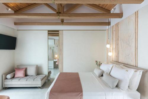 Mirabile Luxury Suites客房内的一张或多张床位