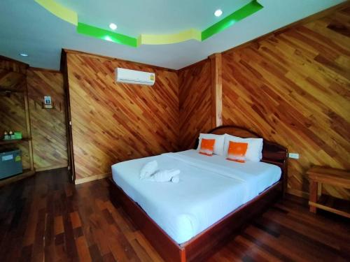 Palmsuay Resort客房内的一张或多张床位
