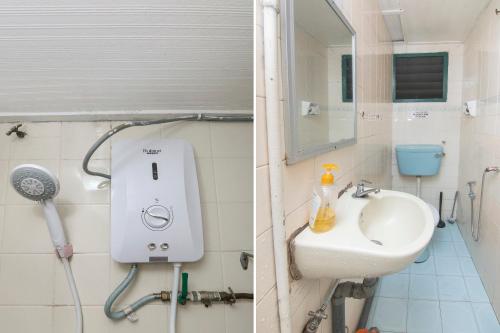 伯恩仓SPOT ON 89789 Hotel Check In 2的一间带水槽和淋浴的浴室