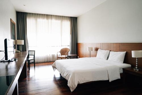 茵帕瓦酒店客房内的一张或多张床位