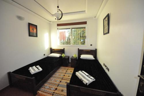 Hola Surf Morocco客房内的一张或多张床位