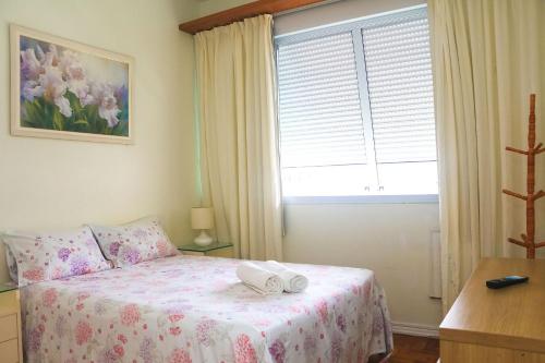 Ipanema Sunset Apartment客房内的一张或多张床位
