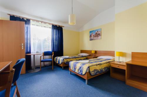 HOTEL A4 Airport Kraków MOP Morawica客房内的一张或多张床位