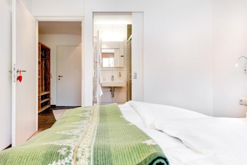 Appartement Valbona Blick by A-Appartments客房内的一张或多张床位