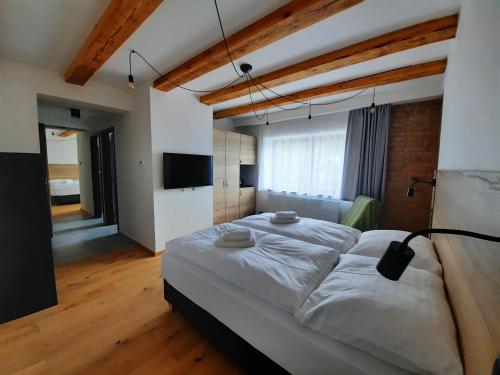 Apartmány Resort Na Horské客房内的一张或多张床位