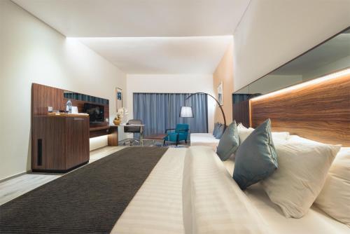 Barracuda Resort客房内的一张或多张床位