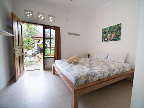 乌鲁瓦图里卡生态旅馆的卧室配有一张床