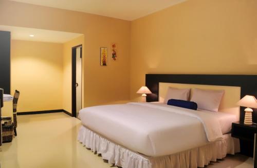Amazing Beach Resort Palu客房内的一张或多张床位