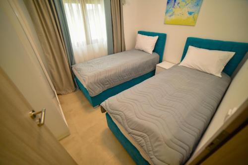Zlatibor Hills Afrodita & Spa客房内的一张或多张床位