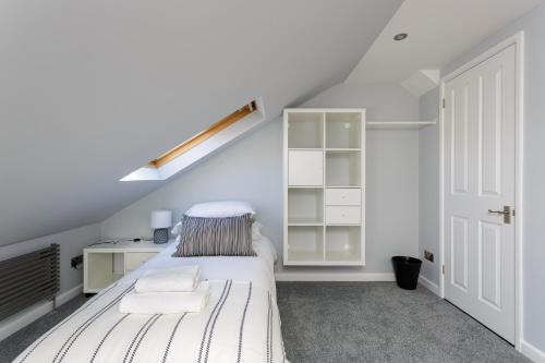 Stopover at ORCHARD LOFT, cosy and convenient客房内的一张或多张床位