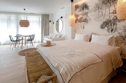 Les Suites de Collioure客房内的一张或多张床位