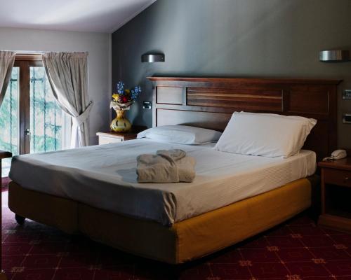 拉皮纳酒店客房内的一张或多张床位