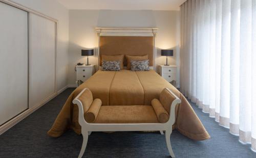 Hotel Afonso V & SPA客房内的一张或多张床位