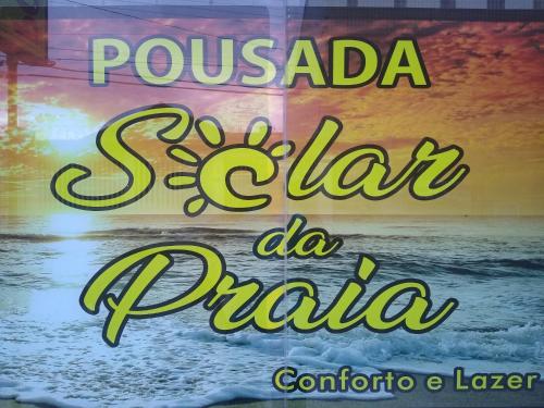 瓜拉派瑞Pousada Solar da Praia的读书的标语
