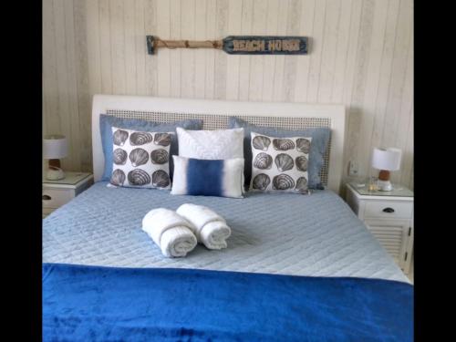 Apt Coral Azul Iberostate Praia do Forte客房内的一张或多张床位
