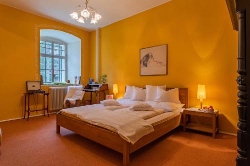 里腾格拉本城堡宫农家乐客房内的一张或多张床位