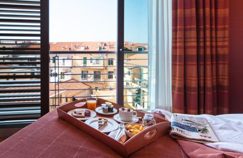 因佩里亚罗西尼阿堤亚托酒店的相册照片