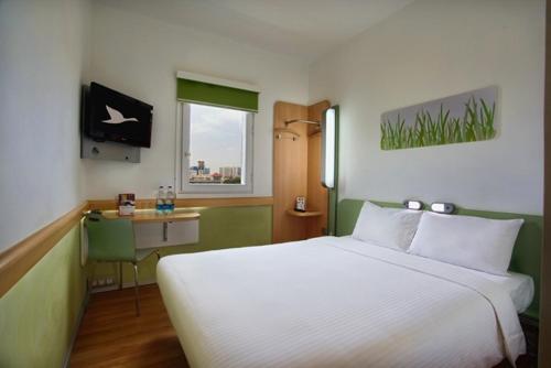 大诺伊达卡斯比亚普罗酒店客房内的一张或多张床位