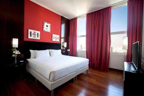NH布宜诺斯艾利斯城市酒店客房内的一张或多张床位
