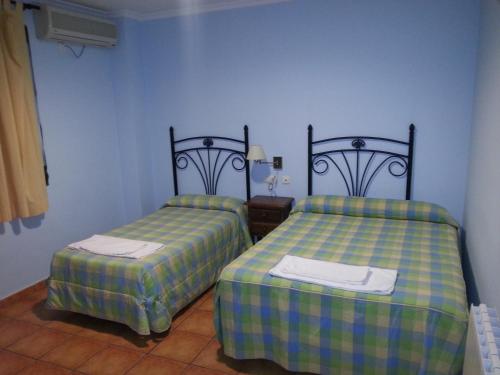 拉斯特雷斯霍塔斯旅舍客房内的一张或多张床位