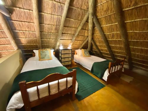 ParkView Safari Lodge客房内的一张或多张床位