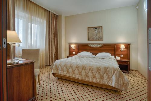 马科斯塔达特酒店客房内的一张或多张床位