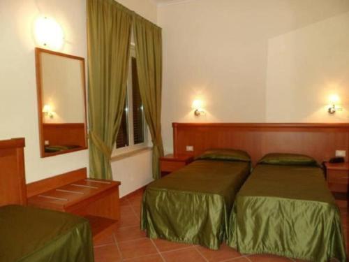 Park Hotel Villamaria客房内的一张或多张床位
