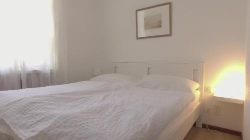 丰泰代菲奥里酒店客房内的一张或多张床位