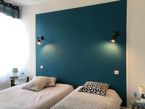 Le 42 Chambre bleue客房内的一张或多张床位