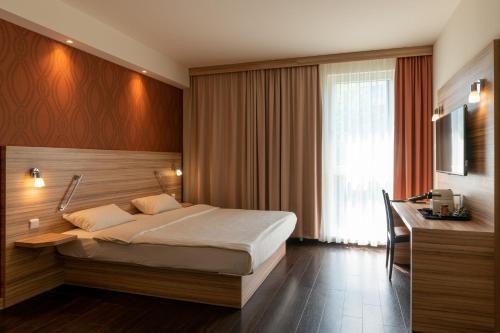 Star G Hotel Premium München Domagkstraße客房内的一张或多张床位