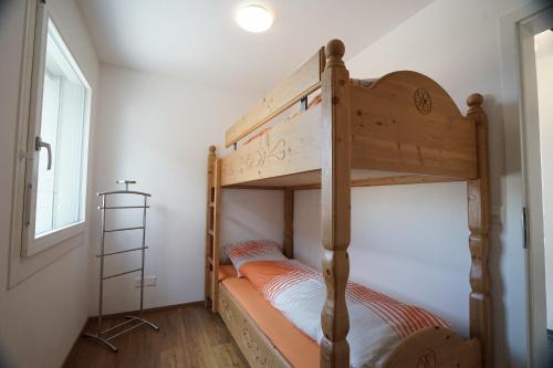 Clasgieri - 3-Zimmer-Ferienwohnung für 4 - 6 Personen, 65m2客房内的一张或多张双层床