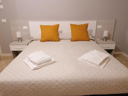 Italaforesteria客房内的一张或多张床位