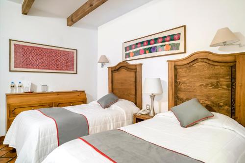 Hotel Posada El Zaguán客房内的一张或多张床位