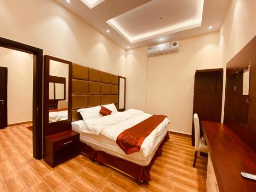 Al Hayat Al Marina Suites客房内的一张或多张床位