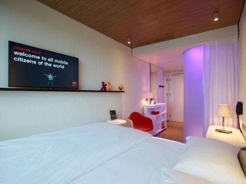 格拉斯哥世民酒店客房内的一张或多张床位