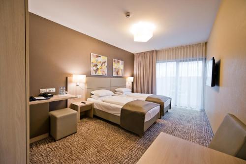 Hotel Molo Resort客房内的一张或多张床位