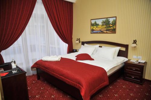 斯拉瓦酒店 客房内的一张或多张床位