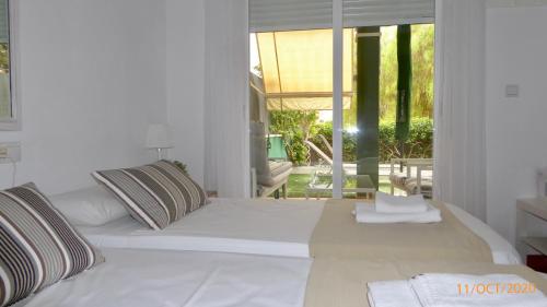 Maison Illeta Golf Bonalba客房内的一张或多张床位