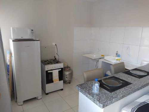 Apartamento no Centro Hospitalar em Teresina !!的厨房或小厨房