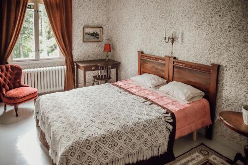 Neitsytniemen Kartanohotelli客房内的一张或多张床位
