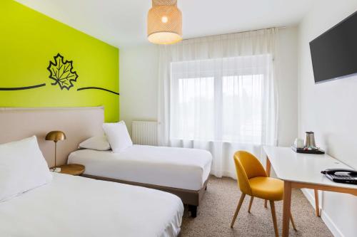 Sure Hotel by Best Western Argentan客房内的一张或多张床位