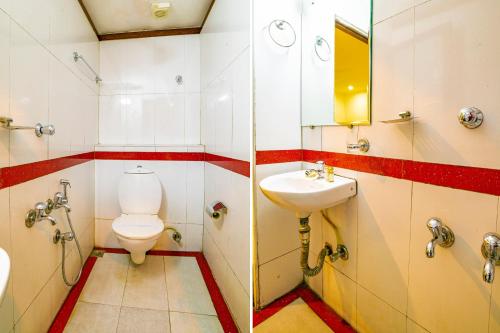 科钦Hotel Pearl Palace的一间带卫生间和水槽的浴室