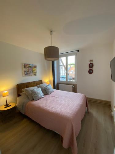L'Ours de Colmar - Appartements en centre ville客房内的一张或多张床位